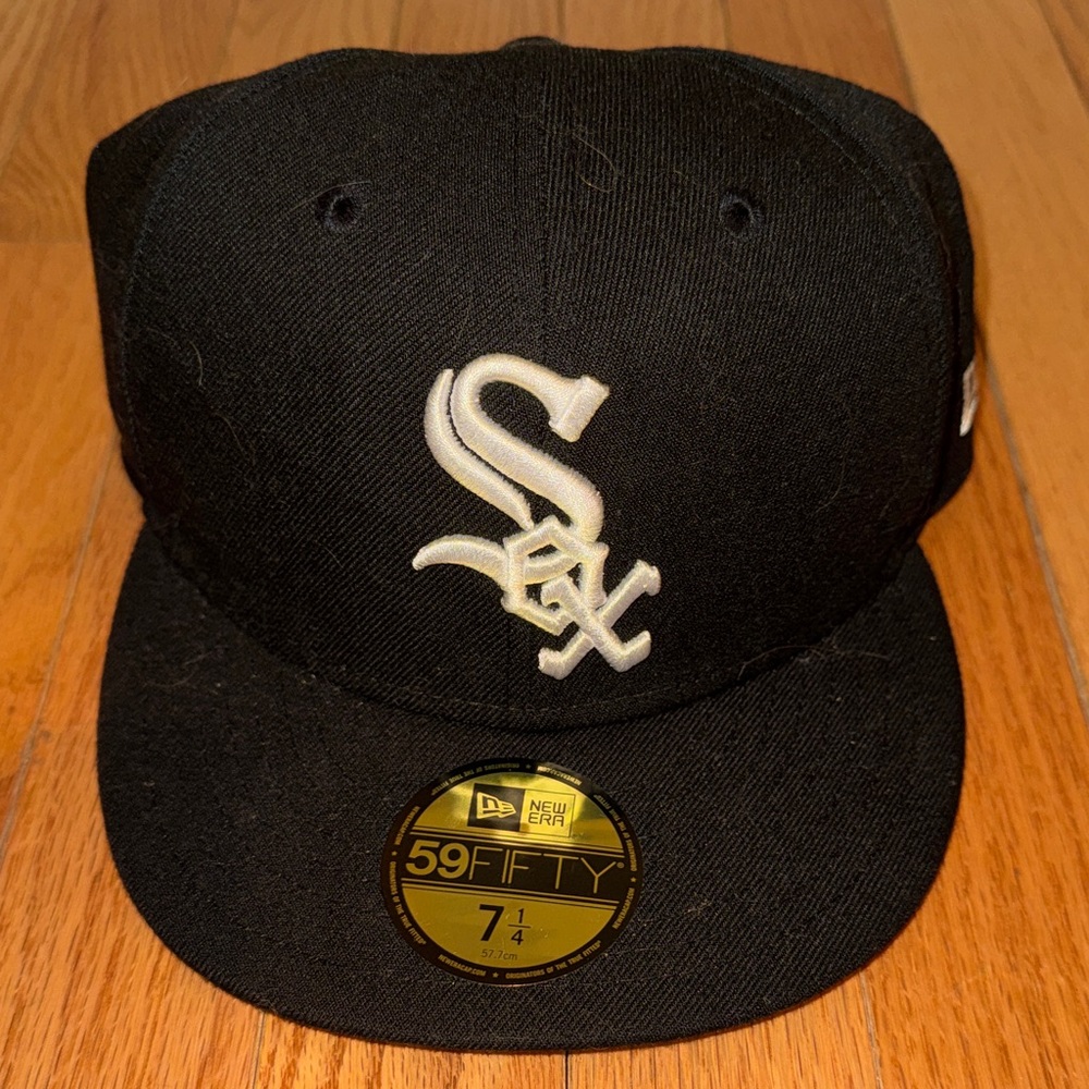 New Era Black Cap with White Embroidery